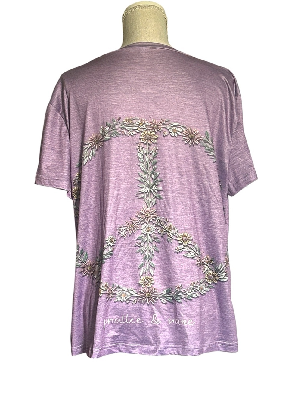 Purple short-sleeve shirt featuring a large floral & leaf peace sign graphic 1X - Picture 3 of 10